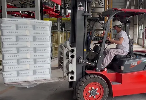 Stretch hood wrapped bags transferred by forklift
