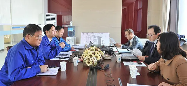 Technical discussion with customers at our facility